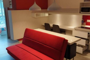 A loft with kitchen + full-condo facilities.